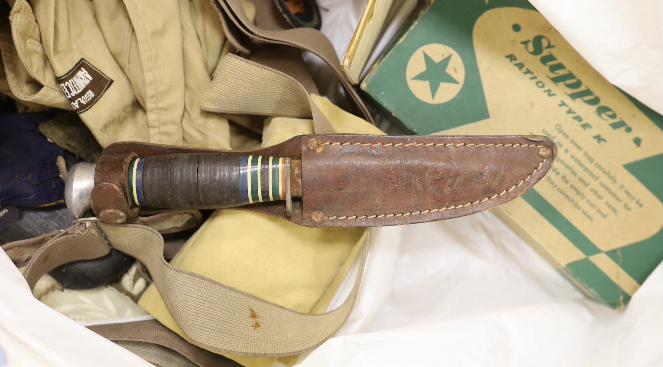 Military interest - a Royal Corps of Signals army uniform, ration kits, field service pocket book, glasses to be worn with a respirator, various badges, knives etc.